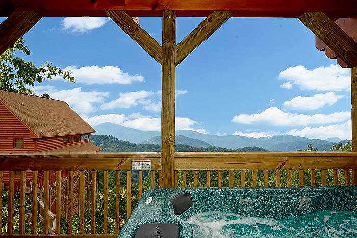 Incredible view from the hot tub on the deck of Mountain Dream, one of the best Townsend TN cabins for a Smoky Mountains vacation.